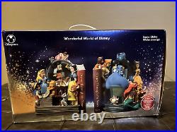 Brand New in Wrapping The Wonderful World Of Disney Bookends Musical Snow Globes