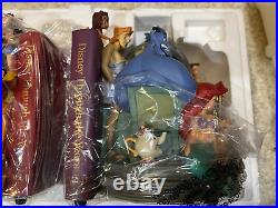 Brand New in Wrapping The Wonderful World Of Disney Bookends Musical Snow Globes