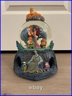 DISNEY Hercules, Meg, And Hades Collectable Snow Globe music box, spins & plays