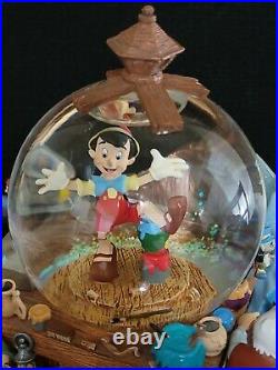 DISNEY Pinocchio & Snow White Share A Dream Come True Musical Snow Globe