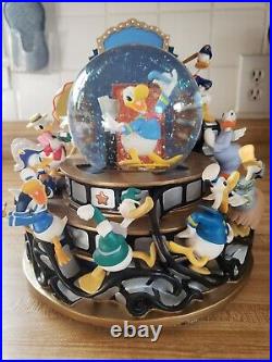 Disney Donald Duck Musical Snow Globe Donald Through The Years