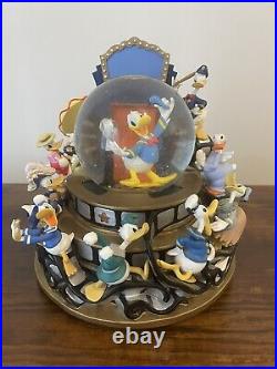 Disney Donald Duck Through the Years Moving Musical Snow Globe Battery Lights