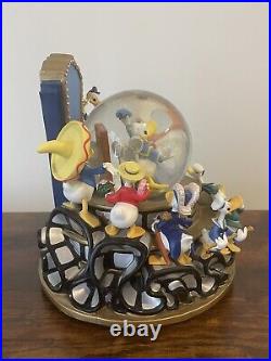 Disney Donald Duck Through the Years Moving Musical Snow Globe Battery Lights