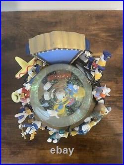 Disney Donald Duck Through the Years Moving Musical Snow Globe Battery Lights