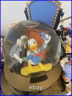 Disney Donald Duck Through the Years Moving Musical Snow Globe Battery Lights