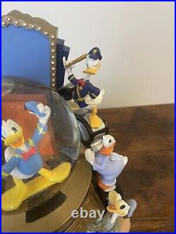 Disney Donald Duck Through the Years Moving Musical Snow Globe Battery Lights