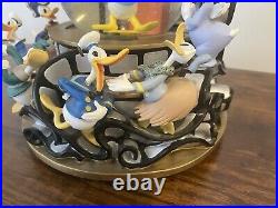 Disney Donald Duck Through the Years Moving Musical Snow Globe Battery Lights