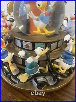 Disney Donald Duck Through the Years Moving Musical Snow Globe Battery Lights