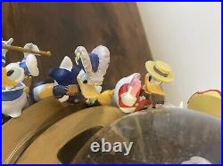 Disney Donald Duck Through the Years Moving Musical Snow Globe Battery Lights