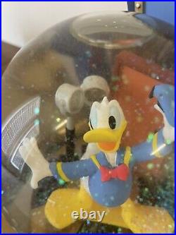 Disney Donald Duck Through the Years Moving Musical Snow Globe Battery Lights