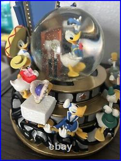 Disney Donald Duck Through the Years Snow Globe WDW Musical Rare