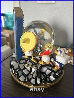 Disney Donald Duck Through the Years Snow Globe WDW Musical Rare