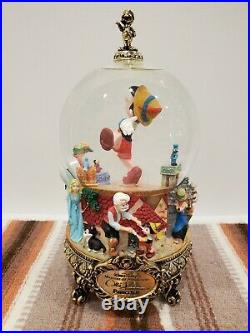 Disney Masters of Animation 9.5 Pinocchio Musical Water Globe. Ollie Johnston