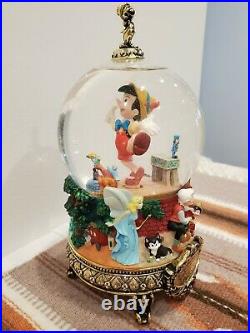 Disney Masters of Animation 9.5 Pinocchio Musical Water Globe. Ollie Johnston