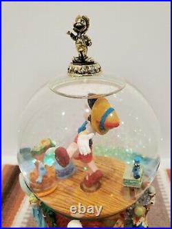 Disney Masters of Animation 9.5 Pinocchio Musical Water Globe. Ollie Johnston