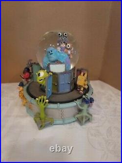Disney Monsters Inc. Musical Monstropolis Glitter Globe with Mike, Sully & Boo