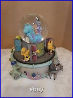 Disney Monsters Inc. Musical Monstropolis Glitter Globe with Mike, Sully & Boo