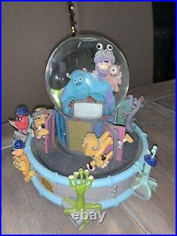 Disney Monsters Inc Musical Monstropolis Snow Globe base rotates