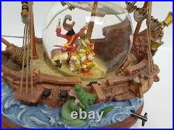 Disney PIRATES OF THE CARIBBEAN Musical Snow Globe Plays You Can Fly Peter Pan