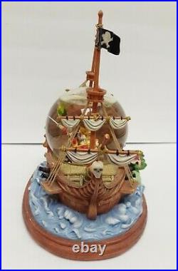 Disney PIRATES OF THE CARIBBEAN Musical Snow Globe Plays You Can Fly Peter Pan