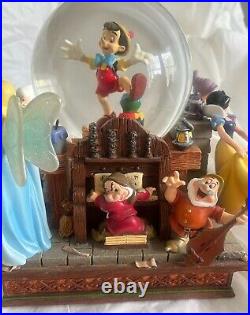 Disney Pinocchio Snow White Dwarfs Share a Dream Come True Musical Snow Globe