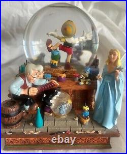 Disney Pinocchio Snow White Dwarfs Share a Dream Come True Musical Snow Globe