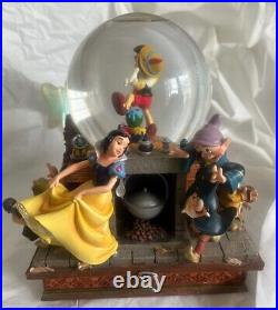 Disney Pinocchio Snow White Dwarfs Share a Dream Come True Musical Snow Globe