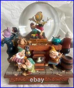 Disney Pinocchio Snow White Dwarfs Share a Dream Come True Musical Snow Globe