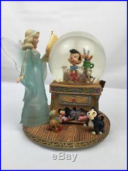 Disney Pinocchio & The Blue Fairy Snow Globe, Music Box Plays Toyland C1