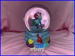 Disney Snow Globe plays music