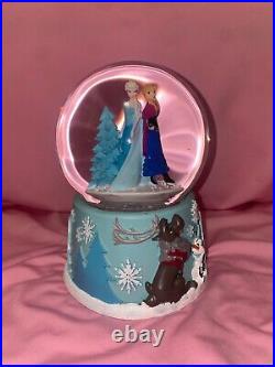 Disney Snow Globe plays music