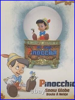 Disney Store Pinocchio Musical Snow globe Wish Upon A Star New In Box