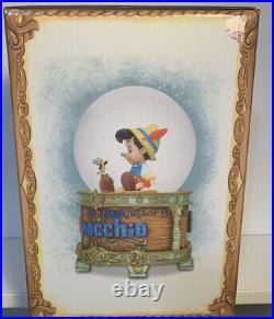 Disney Store Pinocchio Musical Snow globe Wish Upon A Star New In Box