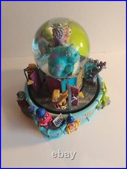 Disney Store Pixar Monsters Inc. Musical Glitter Snow Globe Sulley