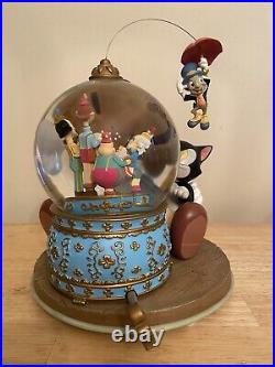 Disney's Rare Pinocchio's Music Box Snow Globe with Jiminy Cricket and Figaro
