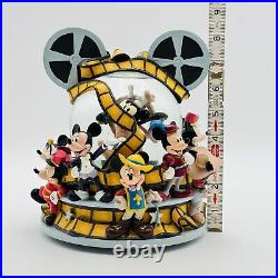 Mickey Mouse Thru the Years DISNEY STORE Reel to Reel Musical Moving Snow Globe