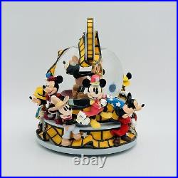 Mickey Mouse Thru the Years DISNEY STORE Reel to Reel Musical Moving Snow Globe