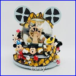 Mickey Mouse Thru the Years DISNEY STORE Reel to Reel Musical Moving Snow Globe