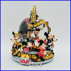 Mickey Mouse Thru the Years DISNEY STORE Reel to Reel Musical Moving Snow Globe