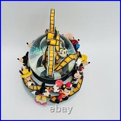 Mickey Mouse Thru the Years DISNEY STORE Reel to Reel Musical Moving Snow Globe