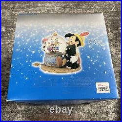 NIB Disney Pinocchio Toyland Fishbowl Cleo Figoro Musical Snow Globe RARE SEALED