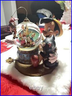 Rare Disney Pinocchio Magic Musical Snow Globe Brahm's Waltz withMotion