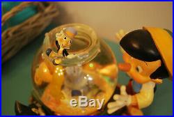 Rare Disney Pinocchio Toyland by Victor Herbert Musical Snow Globe Music Box