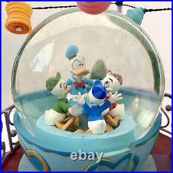 Walt Disney Donald Duck Tea Cup Ride Large Musical Snow Globe In Box